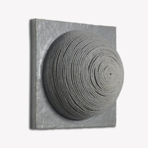 Photo of Eva Hesse's sculpture, No Title, of 1966. Grey metallic acrylic paint and rope embossed hemisphere on papier-mâché on square wood.