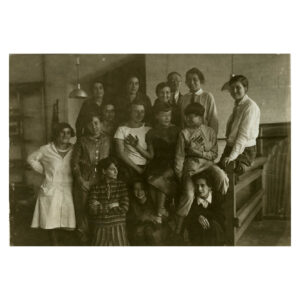 Photo showing Anni Albers (at bottom right) and members of the weaving workshop at the Bauhaus in Dessau (c. 1927). Photo by Lotte Stam-Beese.